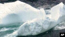 This March 2017 photo released by the U.S. Coast Guard and made by a robotic camera aboard a reconnaissance aircraft, shows icebergs floating near the Grand Banks of Newfoundland in the North Atlantic Ocean. 
