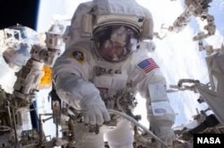 NASA astronaut Peggy Whitson on a spacewalk in March 2017. She holds the record for most spacewalks by a female and now the most days in orbit by an American.