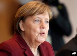 German Chancellor Angela Merkel attends the weekly cabinet meeting at the chancellery in Berlin, Germany, Wednesday, April 5, 2017.