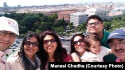 Manasi Chadha (with baby in arms) travelled to Spain with six family members this summer.