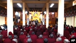 Hundreds of exiled Tibetans and Buddhist monks held public prayers Wednesday in the northern Indian town of Dharamsala.