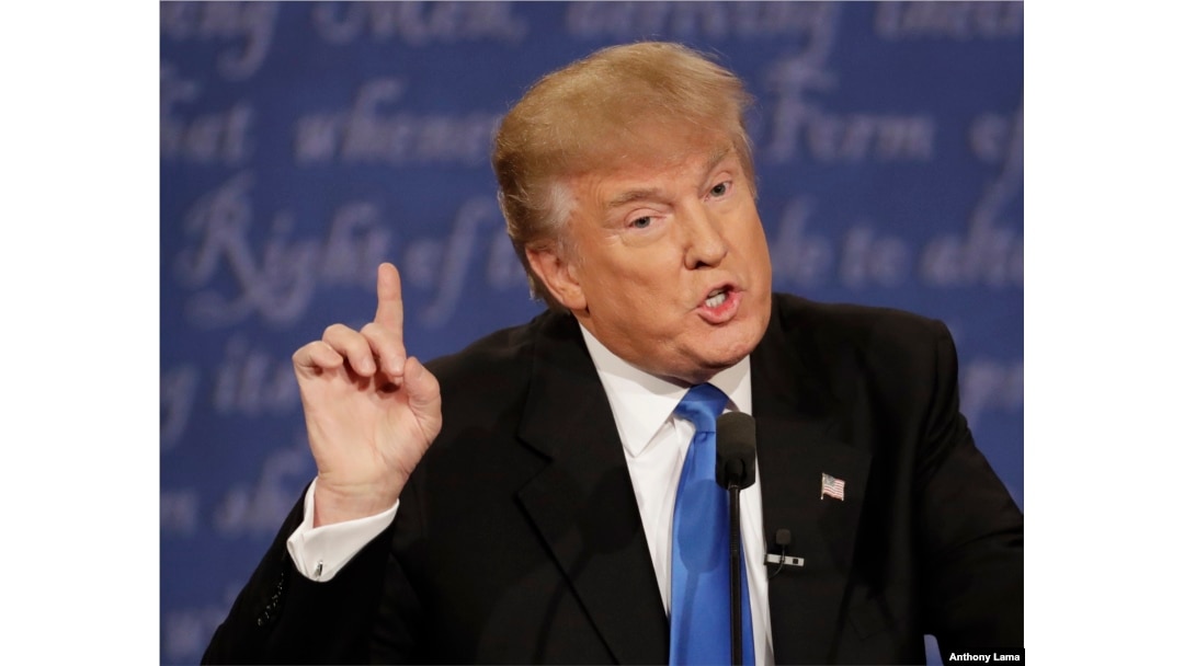 Republican presidential nominee Donald Trump speaks during the presidential debate Democratic presidential nominee Hillary Clinton at Hofstra University in Hempstead, New York, Sept. 26, 2016.