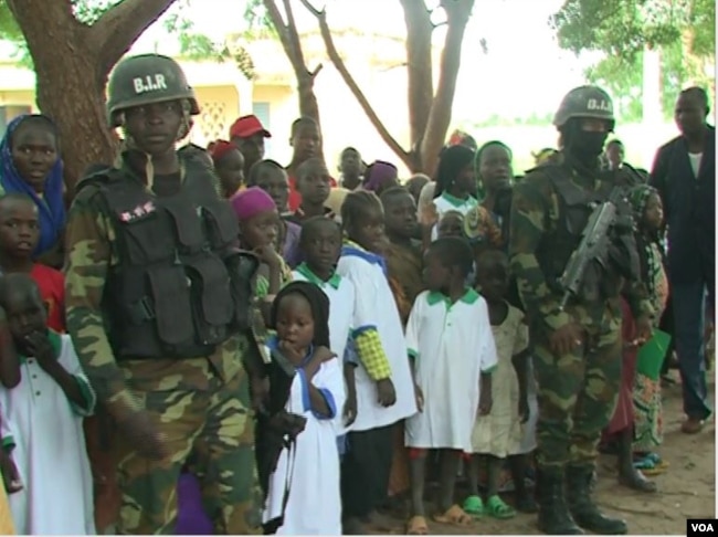 Members of the military are seen guarding the school in Limani, Cameroon. (M.E. Kinzeka/VOA)