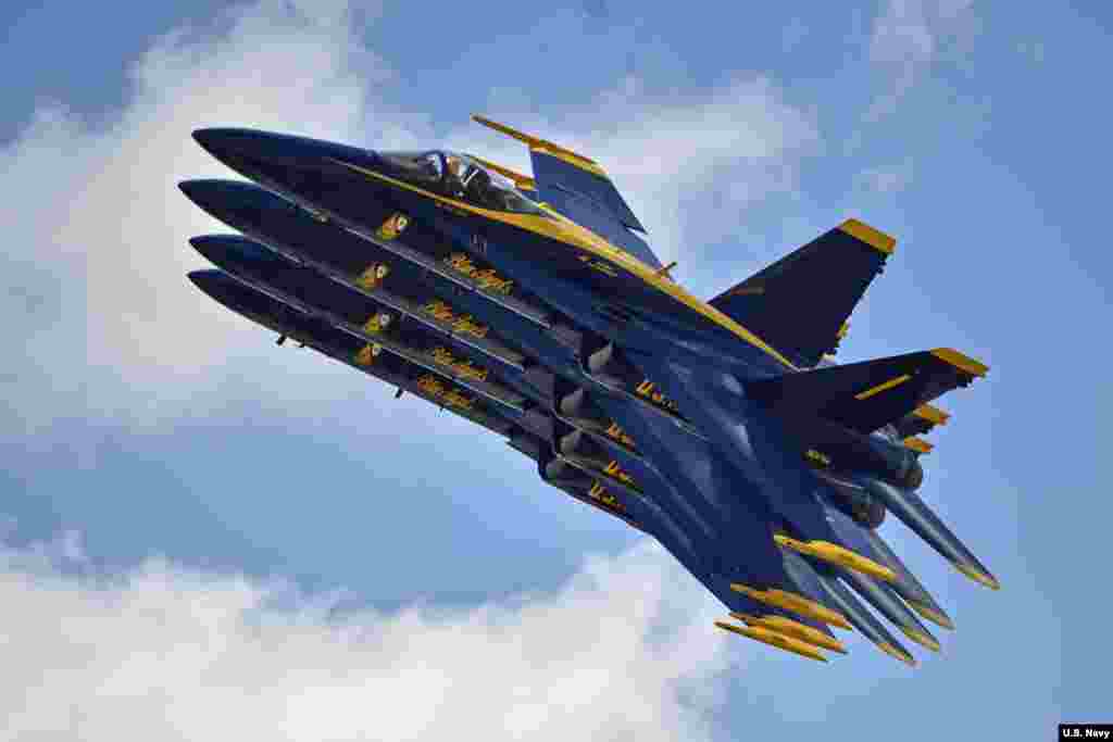 The U.S. Navy flight demonstration squadron, the Blue Angels, perform during the Vectren Dayton Air Show in Dayton, Ohio. 