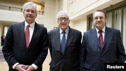 The Joint Special Representative for Syria Lakhdar Brahimi (C) stands with Russian Deputy Foreign Minister Mikhail Bogdanov (R) and U.S. Deputy Secretary of State William Burns as they meet at the United Nations European headquarters in Geneva, Switzerland, January 11, 2013. 