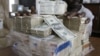 FILE: Lokhu kwenzakala ngomnyaka ka2008. Ngelesos'ikhathi, idollar leMelika lalithengwa ngezigidi ezingamatshumi amabili lanhlanu zamadollar eZimbabwe - ZWL$25 million. 