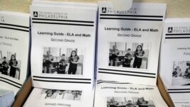 In this Wednesday, March 25, 2019, photo are learning guides to be distributed to students at John H. Webster Elementary School in Philadelphia. Only about half of the district’s high school students have a laptop or tablet and home internet service. (AP)