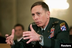 FILE - Lieutenant General David Petraeus testifies to the Senate Armed Forces Committee about his nomination to be general and commander of the Multi-National Forces in Iraq at a hearing on Capitol Hill in Washington, Jan. 23, 2007.