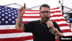 Gavin McInnes speaks during an event called "March Against Sharia" in New York, June 10, 2017.