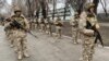 俄罗斯国防部发布的照片显示，集体安全条约组织的维和部队正在哈萨克斯坦的阿尔迈提地区警戒。(2022年1月11日)