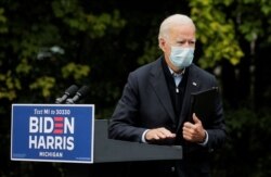 Democratic U.S. presidential nominee Joe Biden departs after speaking during a campaign stop at UFCW (United Food and Commercial Workers) Local 951 in Grand Rapids, Michigan, U.S., October 2, 2020. REUTERS/Brendan McDermid