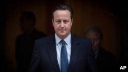 Prime Minister David Cameron leaves 10 Downing Street in London 