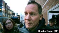 FILE - Harvard University professor Charles Lieber departs federal court, in Boston, Jan. 30, 2020, following his arrest. 