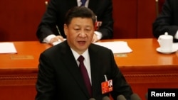 ប្រធានាធិបតី​ចិន​លោក​ Xi Jinping ថ្លែង​នៅ​ឯ​ពិធី​បិទ​មហាសន្និបាត​ប្រជាជន​ នៅ​ឯ​មហាសាល​ប្រជាជន​នៅ​ទីក្រុង​ប៉េកាំង​ ប្រទេស​ចិន​កាល​ពី​ថ្ងៃ​ទី​២០​ ខែ​មីនា​ ឆ្នាំ​២០១៨។