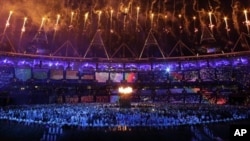 The Olympic cauldron is lit during the opening ceremony at the 2012 Summer Olympics in London, July 28, 2012.