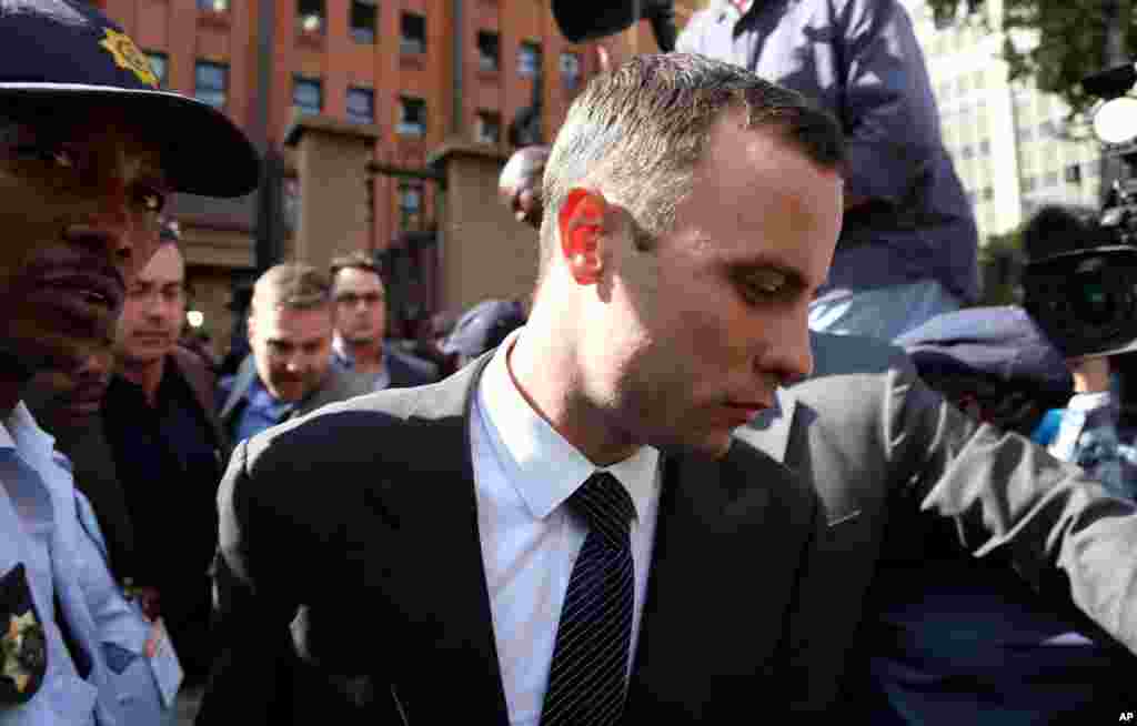 Oscar Pistorius leaves the high court in Pretoria, April 8, 2014.