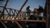Truk-Truk Sipil Terlihat Tinggalkan Kantong ISIS Terakhir di Suriah