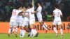 Tunisia's players celebrate after scoring the opening goal during the round of 16 football match between Nigeria and Tunisia in Garoua, Cameroon on Jan. 23, 2022.
