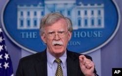 National Security Adviser John Bolton speaks during a briefing at the White House in Washington, Oct. 3, 2018.