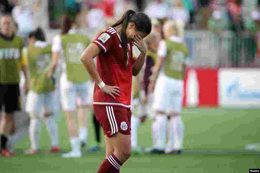 A meio-campista do México Nayeli Rangel (7) reage após o jogo contra a Inglaterra num jogo de futebol no Grupo F do Mundial Feminino da FIFA em Moncton, New Brunswick, Canadá. Englaterra vence 2-1. (Foto por Matt Kryger - USA Today)