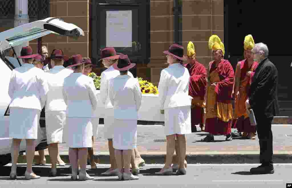 Pallbearers move the coffin of Tori Johnson into a hearse during the funeral service in Sydney, Australia, &nbsp;Dec. 23, 2014.&nbsp;