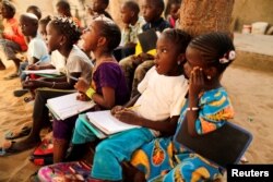 Children attend lessons at the evening school in Ouakam neighborhood, Dakar, Senegal, Jan. 16, 2019.