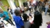 FILE - Members of a Haitian family living in the United States with Temporary Protected Status speak to reporters on May 22, 2017, in Miami, Florida.