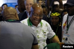 South Africa's President Jacob Zuma reacts during a tour of the Nasrec Expo Center where the 54th National Conference of the ruling African National Congress (ANC) is taking place in Johannesburg, South Africa, Dec. 18, 2017.