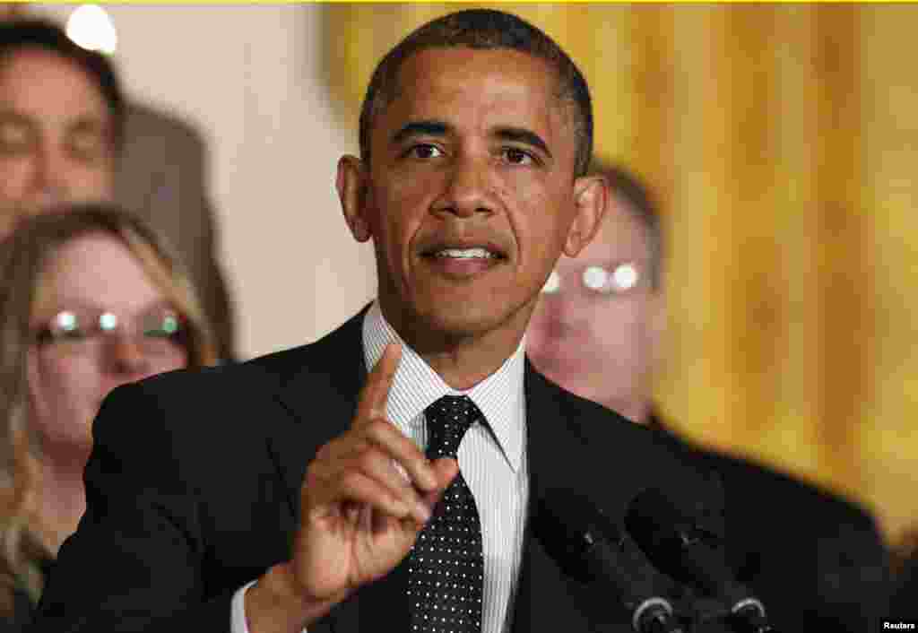 U.S. President Barack Obama delivers a statement on the U.S. "Fiscal Cliff" in the East Room of the White House, November 9, 2012.