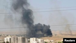 Khói lửa do một hoạt động quân sự gần al-Mansoura, ngoại ô Aleppo, Syria (ảnh tư liệu, 3/6/2013) 