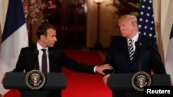 Fransa prezidenti Emmanuel Makron və ABŞ prezidenti Donald Tramp Ağ Evdə birgə mətbuat konfransı zamanı, 24 aprel, 2018.