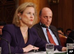 FILE - Robin Raphel, coordinator of the State Department's Office of Iraq Reconstruction, discusses the U.N.'s Oil for Food Program on Capitol Hill, April 7, 2004.