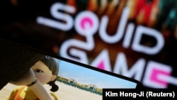 FILE PHOTO: The Netflix series "Squid Game" is played on a mobile phone in this picture illustration.