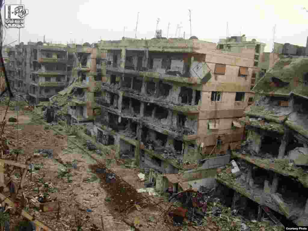 2013年1月30日，在霍姆斯市古賽爾區的薩阿德.阿拉.賈布里街所見到的破壞景象。 (Lens Young Homsi)