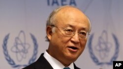 Director General of the International Atomic Energy Agency, IAEA, Yukiya Amano addresses the media during a news conference at the International Center, in Vienna, Austria, June 2, 2014.