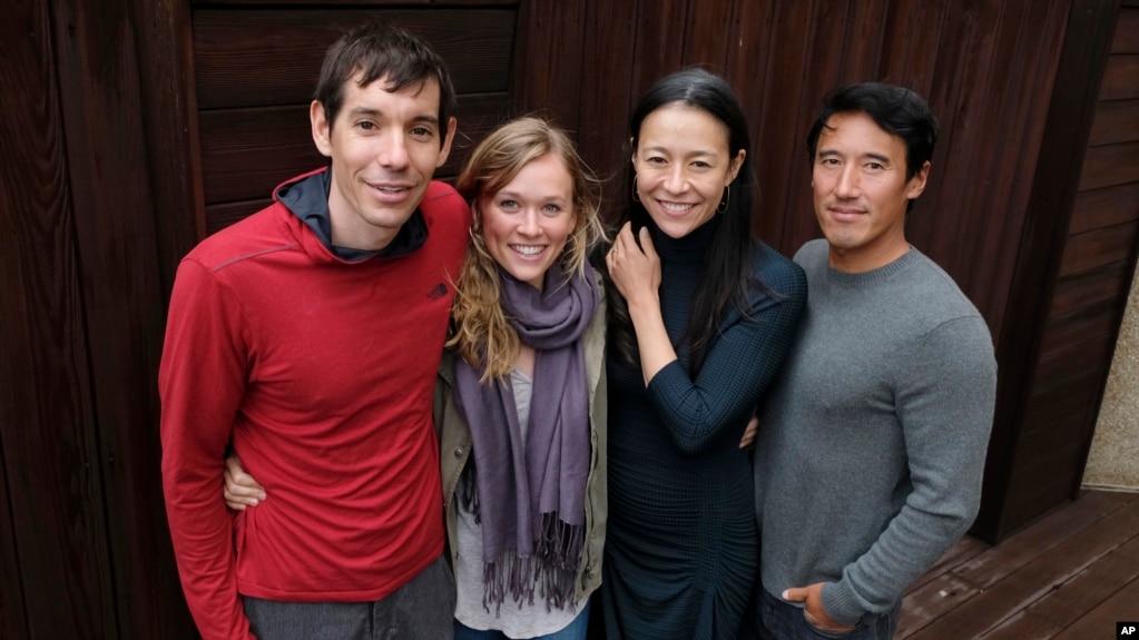 FILE - Alex Honnold, from left, and Sanni McCandless, subjects of the documentary film "Free Solo," pose with co-directors Elizabeth Chai Vasarhelyi and Jimmy Chin at the InterContinental Hotel during the Toronto International Film Festival in Toronto, Sept. 10, 2018.