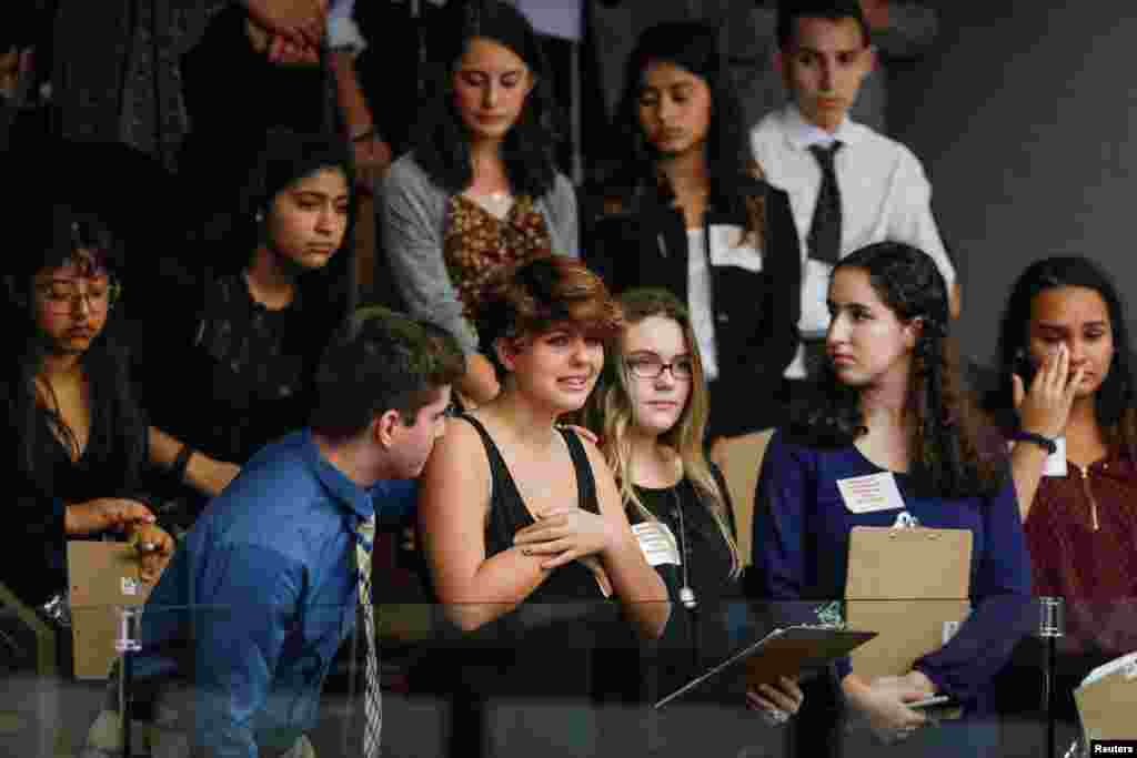 Students from Marjory Stoneman Douglas High School and those supporting them react as they watch the Florida House of Representatives vote down a procedural move to take a bill banning assault weapons out of committee and bring it to the floor for a vote in Tallahassee, Florida, following last week&#39;s mass shooting on their campus, Feb. 20, 2018.