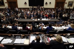 Former special counsel Robert Mueller is sworn in before testifying to the House Judiciary Committee about his report on Russian interference in the 2016 presidential election on Capitol Hill on Wednesday, July 24, 2019, in Washington.