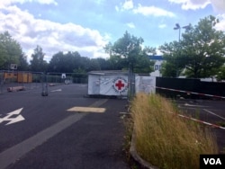 Like many large camps, this one has been closed in recent months as the flow of refugees has been nearly-halted by closed borders. But late last year, this camp outside of Dresden, Germany was attacked with rocks and gunfire, July 7, 2016. (H. Murdock/VOA)