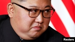 Lãnh tụ Bắc Hàn Kim Jong Un trong cuộc gặp với Tổng thống Donald Trump hồi tháng Sáu.