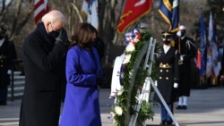 US President Joe Biden and Vice President Kamala Harris lay a wreath at the Tomb of the Unknown Soldier in Arlington Cemetery in Arlington, Virginia, on January 20, 2021. (Photo by JIM WATSON / AFP)