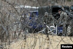 A barbed-wire fence is set up around a golf course owned by Lotte, where the U.S. Terminal High Altitude Area Defense (THAAD) system will be deployed, in Seongju, South Korea, March 1, 2017.