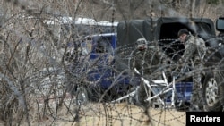 A barbed-wire fence is set up around a golf course owned by Lotte, where the U.S. Terminal High Altitude Area Defense (THAAD) system will be deployed, in Seongju, South Korea, March 1, 2017.