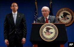Attorney General Jeff Sessions, joined by Deputy Attorney General Rod Rosenstein, left, speaks news conference at the Attorney's Office for the District of Columbia in Washington, Oct. 15, 2018, to announce on efforts to reduce transnational crime.