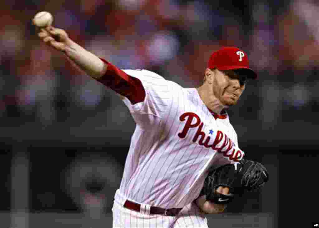 Philadelphia Phillies starting pitcher Roy Halladay delivers to a Cincinnati Reds batter during the fifth inning of Game 1 of baseball's National League Division Series, Wednesday, Oct. 6, 2010, in Philadelphia. Halladay pitched a no-hitter. The Phillie