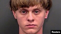 FILE - Dylann Roof is seen in this June 18, 2015 handout booking photo provided by Charleston County Sheriff's Office. (Courtesy of Charleston County Sheriff's Office.)