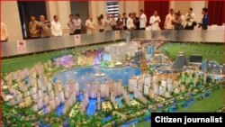 ຕົວແບບຂອງໂຄງການພັດທະນາບຶງທາດຫຼວງ ຢູ່ໃນເຂດເສດຖະກິດ ສະເພາະ ທີ່ນະຄອນຫຼວງວຽງຈັນ.