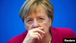 German Chancellor Angela Merkel attends a board meeting following the Hesse state election in Berlin, Germany, October 29, 2018.