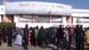 FILE - People queue to enter the Court in Dakar on Dec. 14, 2017, to attend the trial of Dakar's popular mayor Khalifa Sall and four of his associates on charges of embezzling public funds. 