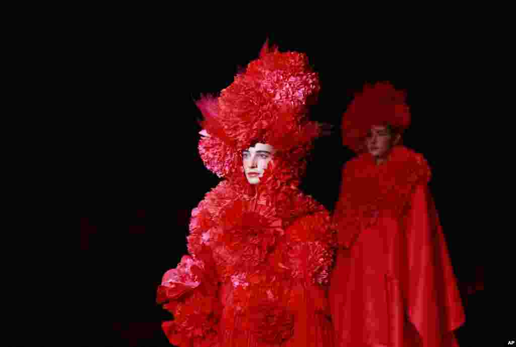 Models display a creation by Tokuko Maeda during the 2017 Autumn/Winter Collection at the Tokyo Fashion Week in Tokyo, Japan.